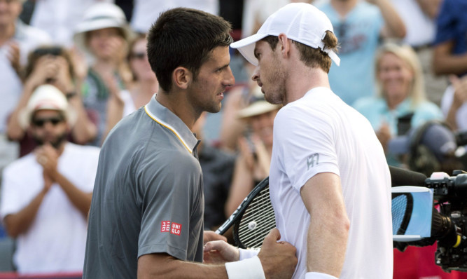 Novak Djokovic congratulates Andy Murray on his win.