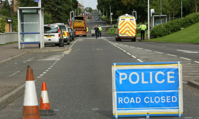 Police on South Road in Dundee after a girl was hit by a lorry