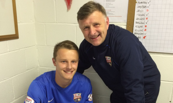 Greg Pascazio is welcomed by Montrose boss Paul Hegarty.