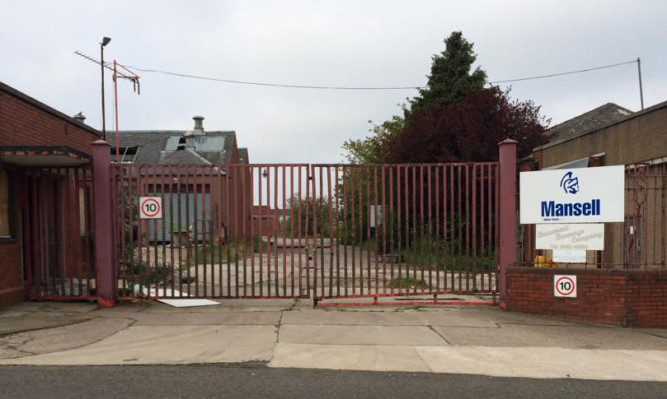 The committee heard the remaining buildings at the fomer factory site are now in a poor condition.