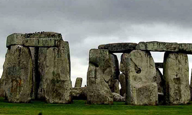 General view at Stonehenge, Amesbury. Plans for a new World Heritage landscape around Stonehenge, and new visitor reception building 3km from Stonehenge were announced.   19/12/03: Best-selling American author Bill Bryson is to visit Stonehenge today, in his new role as an English Heritage Commissioner. The adopted Anglophile last visited the World Heritage site in Wiltshire 10 years ago while researching his book on the eccentricities of British life, Notes from a Small Island. He was appointed a commissioner in September by Culture Secretary Tessa Jowell and will remain in the post for four years. Sir Neil Cossons, chairman of English Heritage, which looks after Stonehenge, said: "We are delighted to welcome Bill Bryson as an English Heritage Commissioner."
