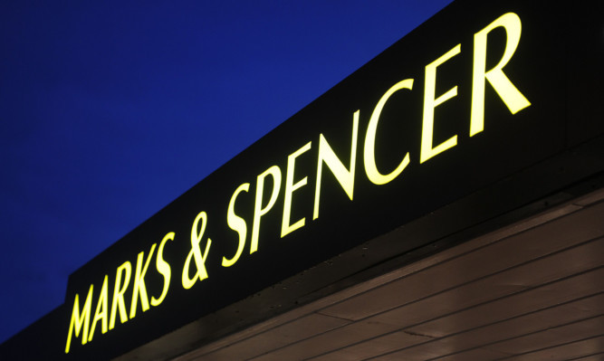 Kim Cessford - 06.01.14 - FOR FILE - pictured is the illuminated Marks and Spencer - M+S - sign above the entrance to the chains Simply Food store, Brook Street, Broughty Ferry