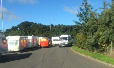 Travellers caravans apparently blocking the entrance to Dunnikier Business Park in Kirkcaldy.