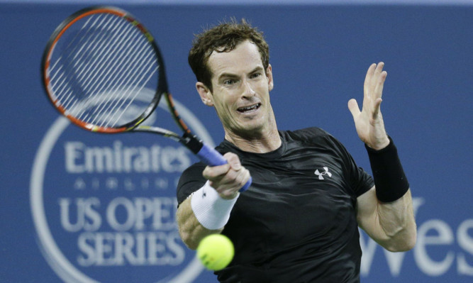 Andy Murray plays a return to Mardy Fish.
