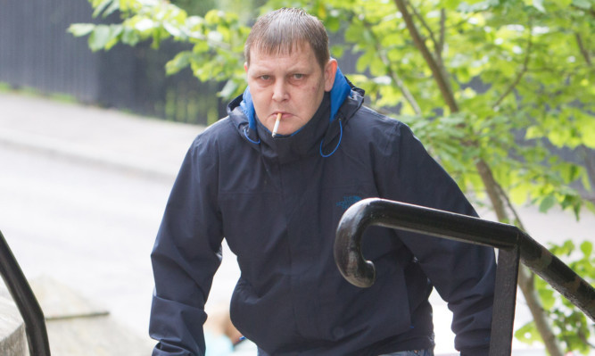 John Towns arriving at Forfar Sheriff Court.