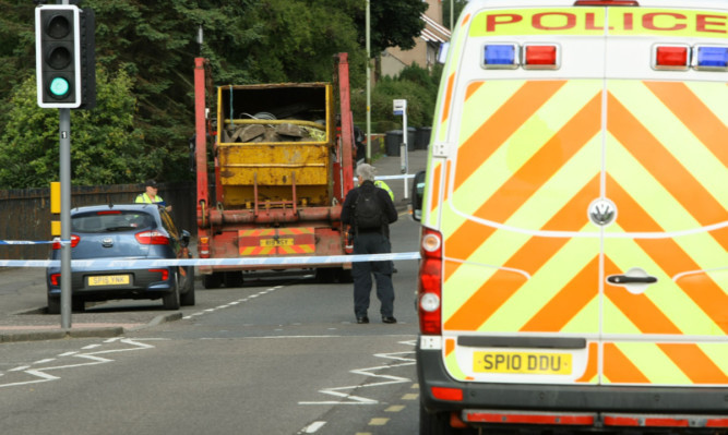 Police at the scene of the accident on Monday.