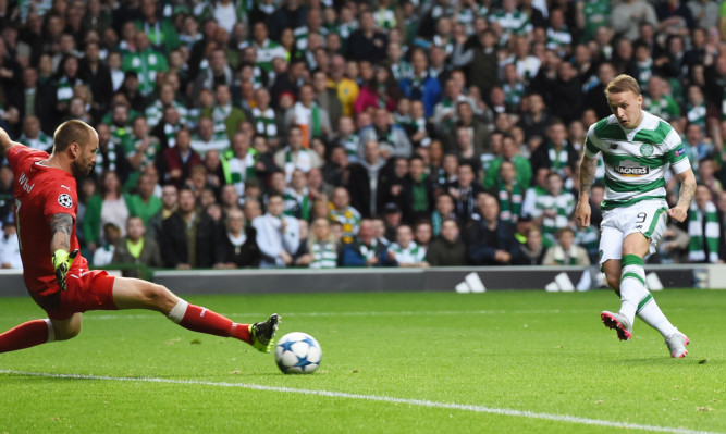 Leigh Griffiths slots the ball past Malmo keeper Johan Wiland to opening the scoring on Wednesday night.