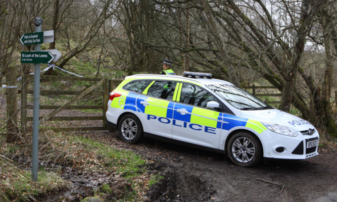 Police at Loch of the Lowes after last week's tragic discovery.