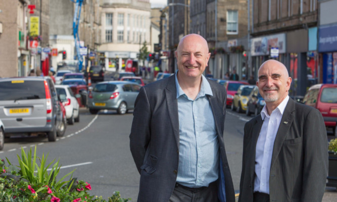 Councillors Neil Crooks and Danny Cepok on Kirkcaldy High Street.