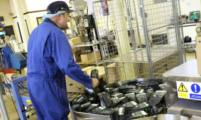 A worker at the firms Milnbank Road premises.