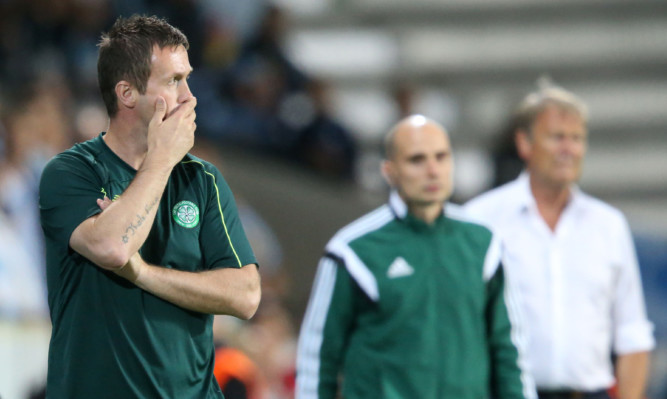 Ronny Deila looks on as Celtic head for the Champions League exit.