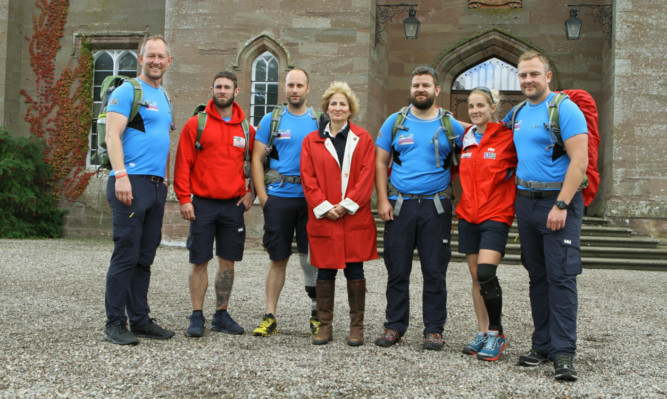 Lady Stormont with the Walking With The Wounded walkers at Scone Palace. The walkers will be joined on the route by Prince Harry, the charitys patron.