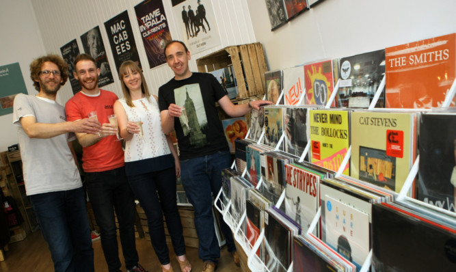 COURIER, DOUGIE NICOLSON, 27/08/15, NEWS. Pictured in the new assai record shop in Broughty Ferry which opened tonight, Thursday 27th August 2015, are L/R, Andy McLaren, Richard Fyffe, Claire and Keith Ingram. Story by reporters.