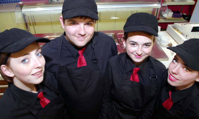 Students Demi Lyons, Kevin Ross, Chelsea Young and Amy Revell prepare to serve up treats at KC Café Bar.