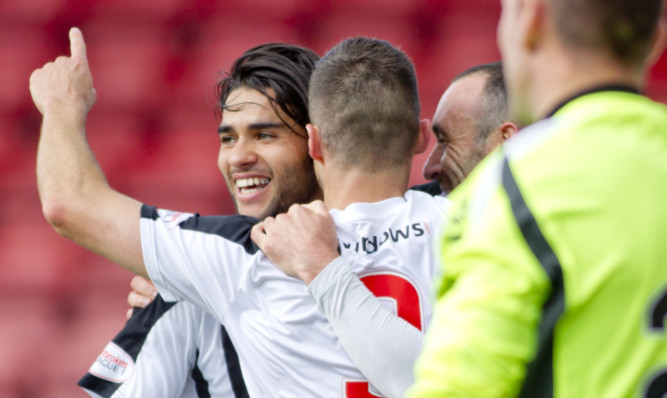 Faissal El Bahktaoui celebrates his 12th goal of the season.