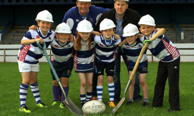 Club president Murdo Fraser, left, and site manager Andy Raeburn with, from left, Grace Mather, Murray Clunie, Eilidh Bennett, Adam Williamson, Ben Black, Monty Smith.