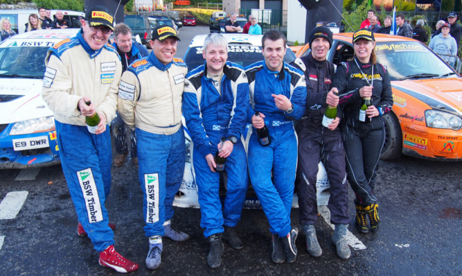 Last years Colin McRae Forest Stages Rally winners (from left) Peter Foy and Mike Faulkner (2nd overall), Paul Beaton and Euan Thorburn (winners), and Jock Armstrong and Paula Swinscoe (3rd overall).