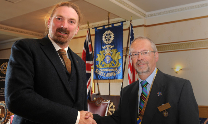 Chris Law, left, with Dundee Rotary president David Laing.