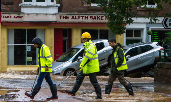 The flooding devastated the town centre.