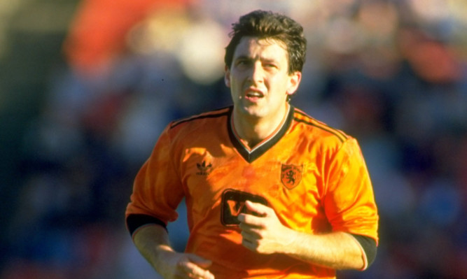 Ralph Milne of Dundee United in action during a Scottish Premier Division match against Aberdeen at Pittodrie Stadium in 1985.