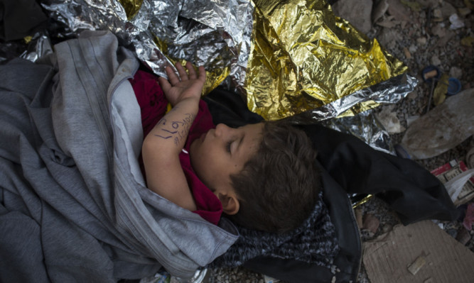 A young Syrian refugee on the Greek island of Lesbos.