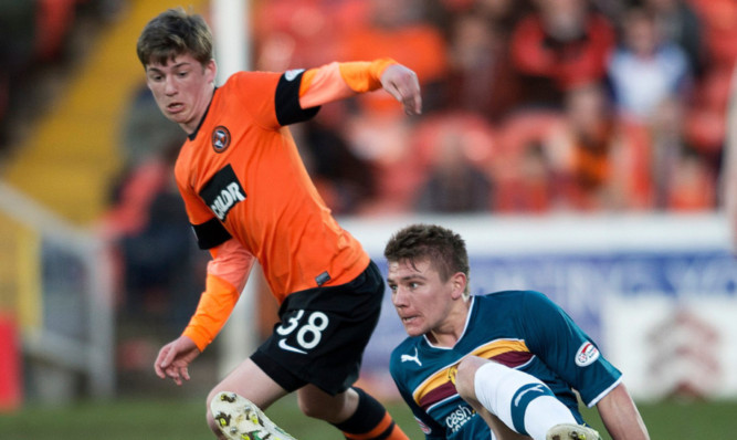 Ryan Gauld is challenged by Motherwells Shaun Hutchinson in last months league game.