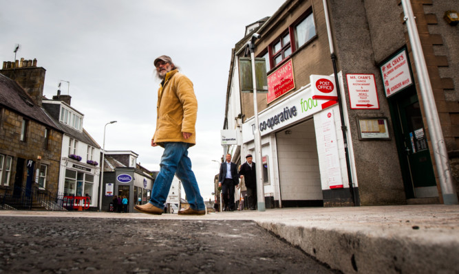 Ken Miles crossing the High Street under the new shared space system.