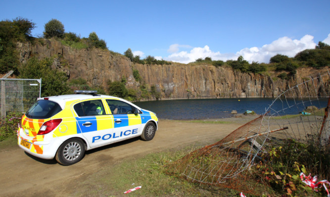 Police at Prestonhill after Cameron Lancaster died at the quarry last year.
