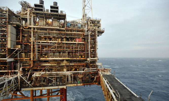 A picture shows section of the BP ETAP (Eastern Trough Area Project) oil platform in the North Sea, around 100 miles east of Aberdeen, Scotland on February 24, 2014. The British cabinet will meet in Scotland for only the third time in history to announce plans for the country's oil industry, which it warns will decline if Scots vote for independence. The fate of North Sea oil revenues will be a key issue ahead of the September 18 referendum to decide whether Scotland will end its 300-year-old union with England, and is expected to be the focus of Prime Minister David Cameron's cabinet meeting.  AFP PHOTO / POOL / ANDY BUCHANAN
