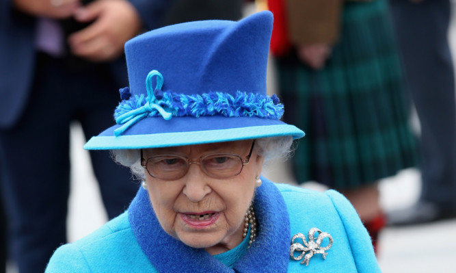 The Queen at Tweedbank Station on the days she became the longest reigning monarch in British history overtaking her great-great grandmother Queen Victoria's record by one day.