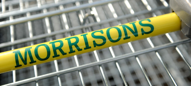 General view of signage for Morrisons supermarket on a trolley handle