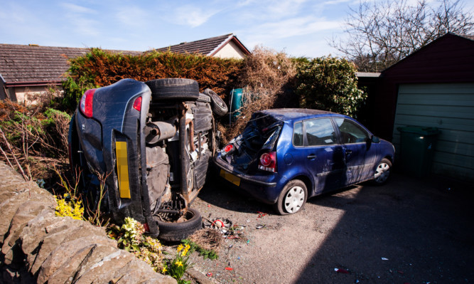 Young crashed his car through a wall and into the garden of the home in Kingennie.