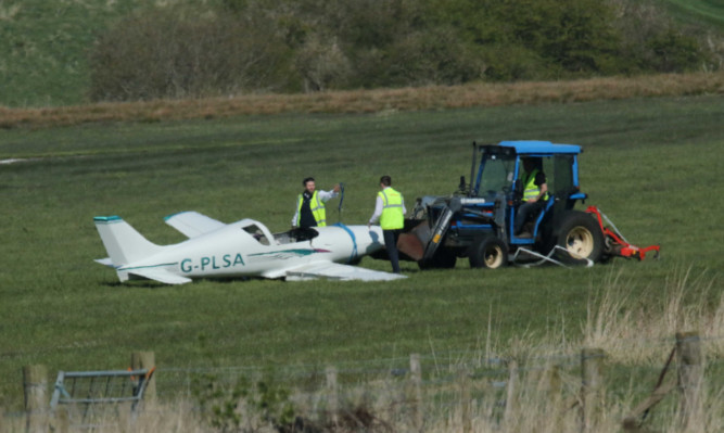 The pilot tried to land the plane three times.