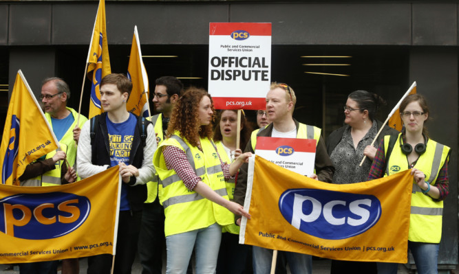 Members of the Public and Commercial Services outside the National Museum of Scotland in Edinburgh.