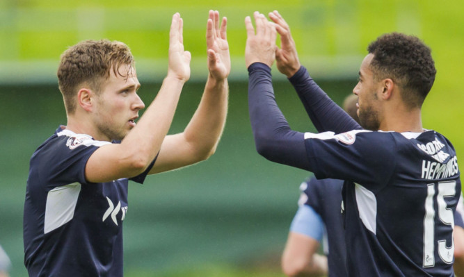 Dundee's Greg Stewart celebrates his goal with team-mate Kane Hemmings.