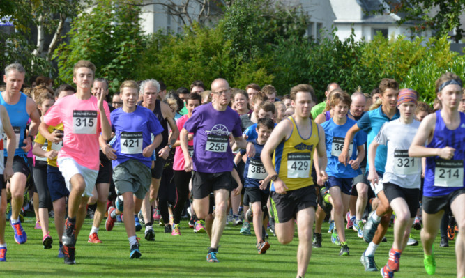 Some of those who took part in the 5km run at St Andrews University playing fields.