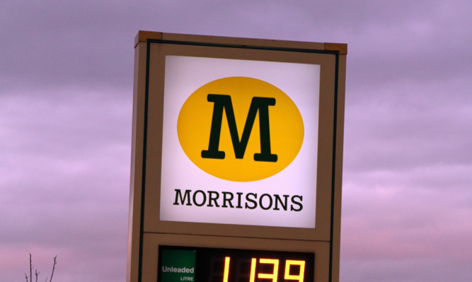 Police are investigating after the mother became concerned while checking her tyre pressure at the Morrisons supermarket.