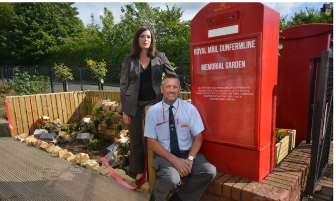 MSP Cara Hilton with postal worker and organiser Garry Haldane.