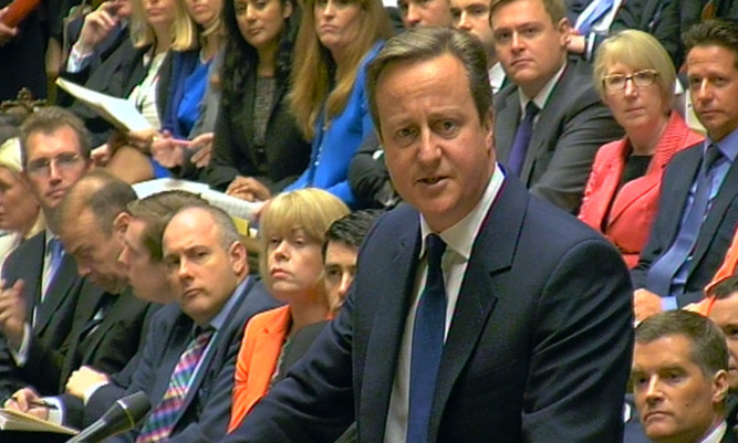 Prime Minister David Cameron speaks during Prime Minister's Questions.