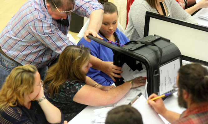 Ballot boxes arriving at the Dundee count on referendum night.