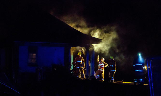 Fire crews tackle the blaze at Baxter Park in April.