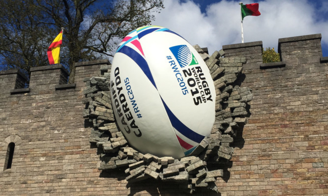 A giant rugby ball on the walls of Cardiff Castle to mark the start of the Rugby World Cup.