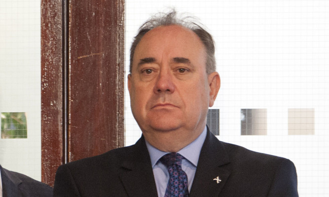 Alex Salmond watching from the wings as Nicola Sturgeon delivered a speech in Edinburgh marking a year since the referendum.