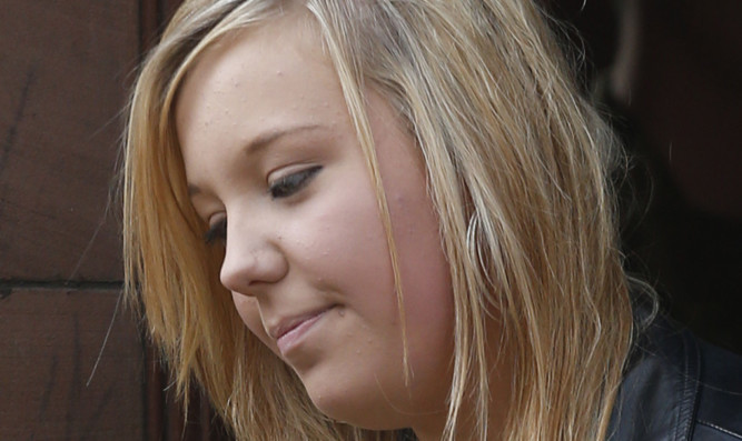 Haines memorial
Bethany Haines, the daughter of David Haines, one of two British aid workers beheaded by Islamic militants, arrives at the Perth Congregational Church for his memorial service.