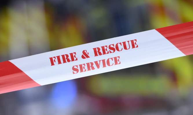 08.05.15 - FOR FILE - pictured at the scene of the fire on Princes Street, Dundee is the Fire and Rescue Service cordon tape