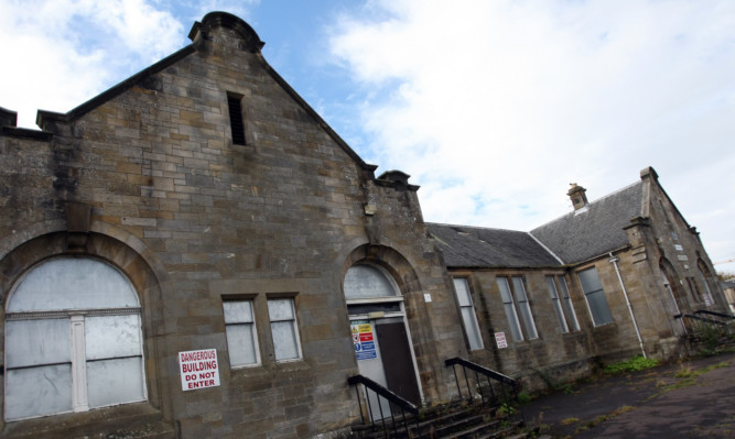 There are calls for councils to use empty buildings, like the former Kinross High School, to house refugees.