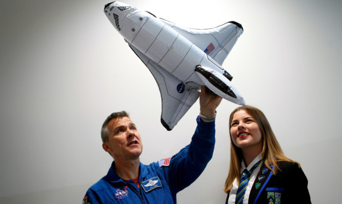 Former NASA astronaut Lt Col Duane Carey talking to Hazel Barlow at Auchmuty High School, Glenrothes