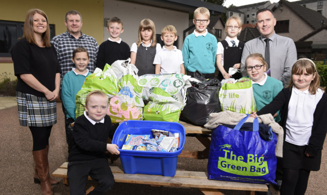 Youngsters from Strathmore Primary School, have been busy collecting food and clothing which was handed over to the Angus Solidarity For Refugees group.