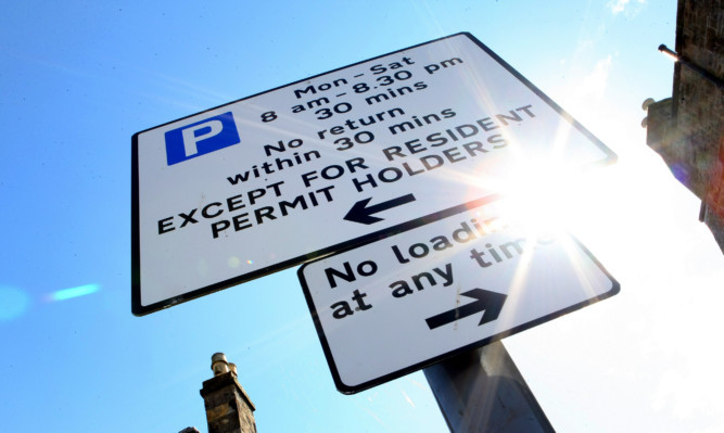 Parking rates are to be cut to encourage more people to the town centre.