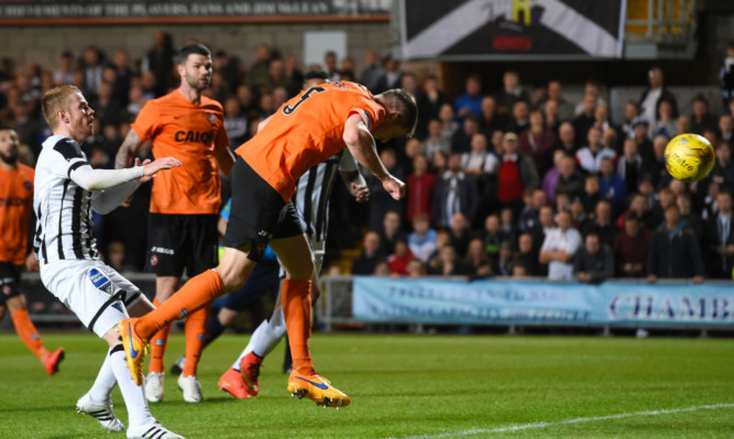 Callum Morris heads home the equaliser for United.